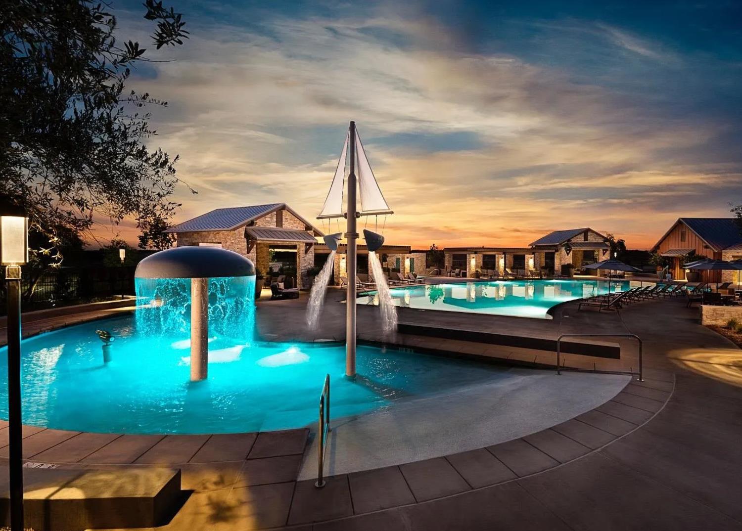 123 Capstone Way South Madera, CA 93636 - Photo 27 of 32 a view of swimming pool with outdoor seating and a garden