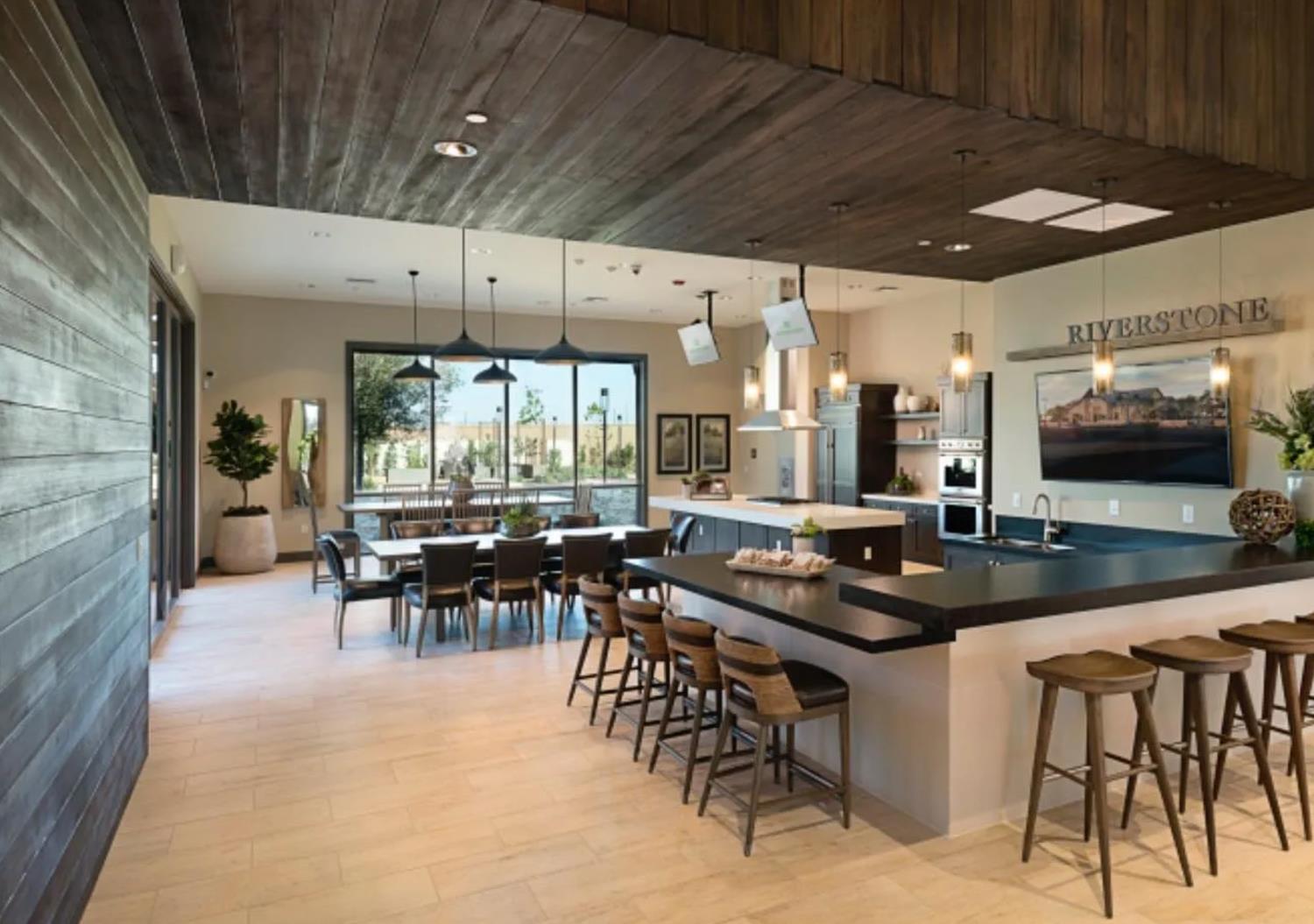 123 Capstone Way South Madera, CA 93636 - Photo 30 of 32 a kitchen with a table and chairs in it