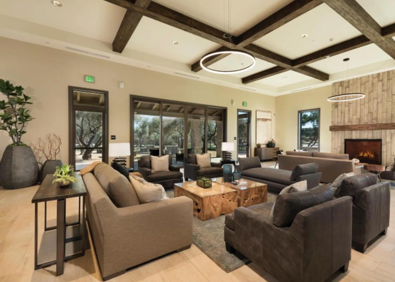 123 Capstone Way South Madera, CA 93636 - Photo 31 of 32 a living room with fireplace furniture and a large window