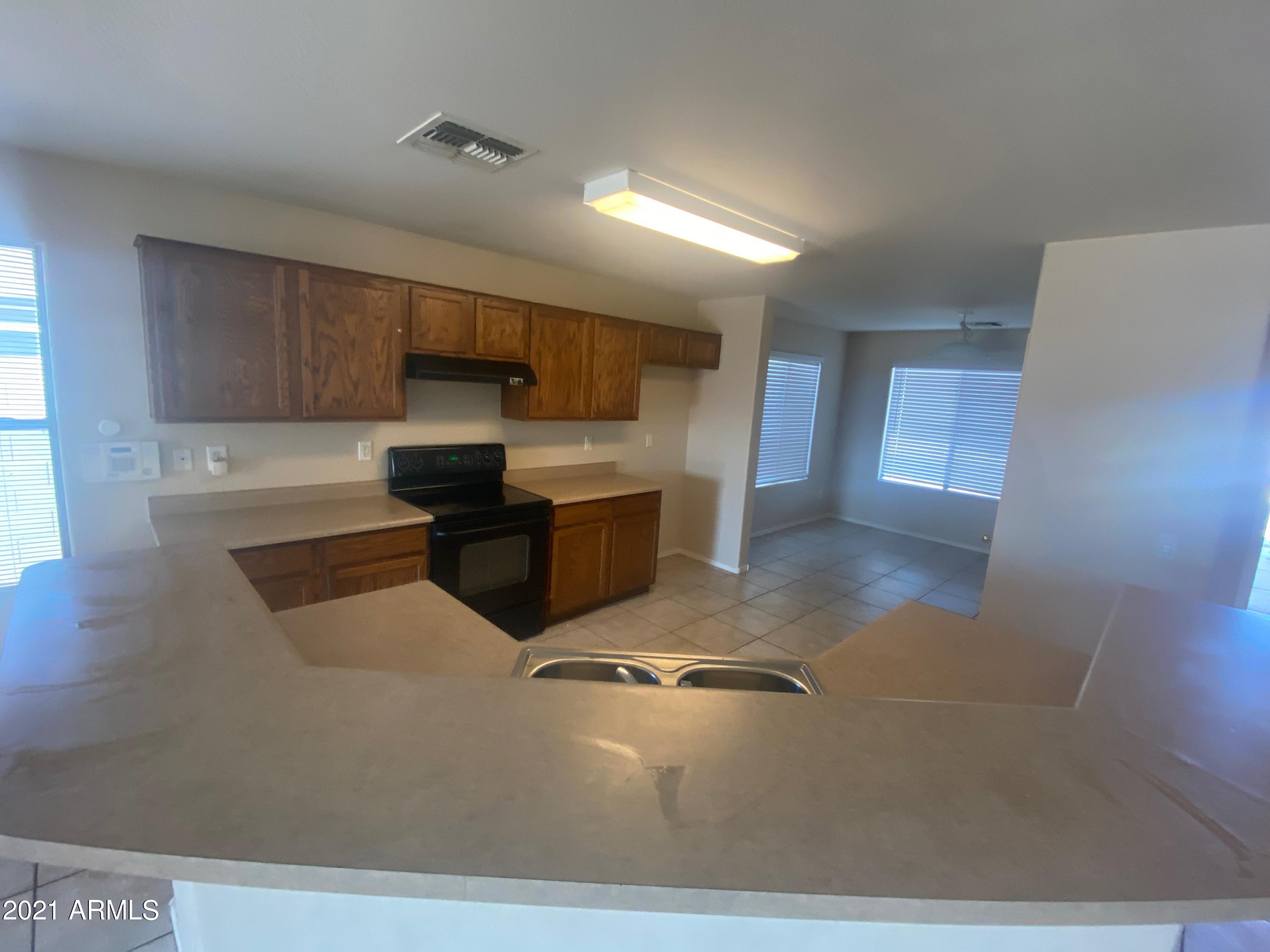 9945 West Heber Road Tolleson, AZ 85353 - Photo 5 of 11 IMG_6142