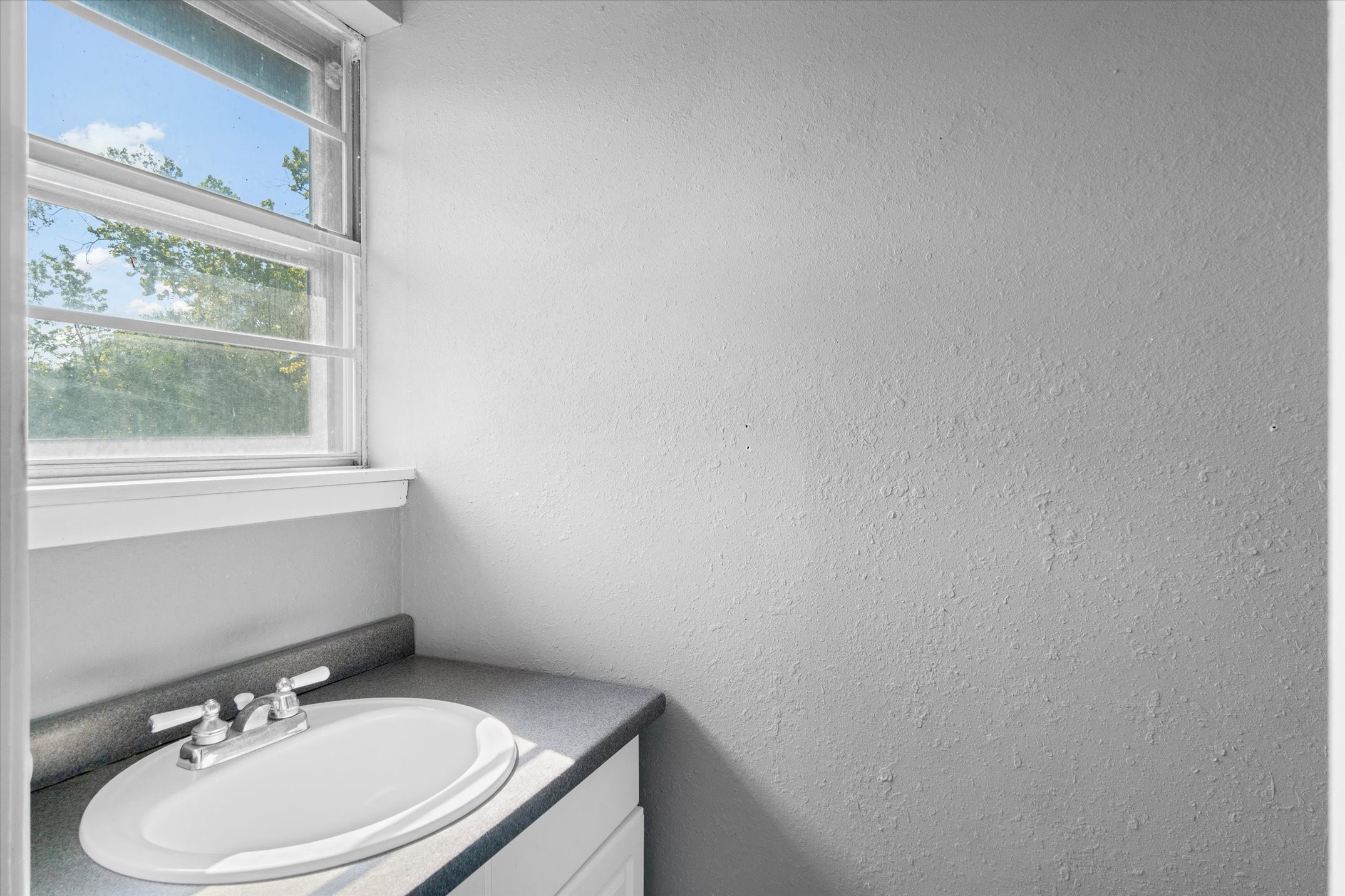 410 Williams Street Athens, TX 75751 - Photo 20 of 30 a bathroom with a sink and a mirror