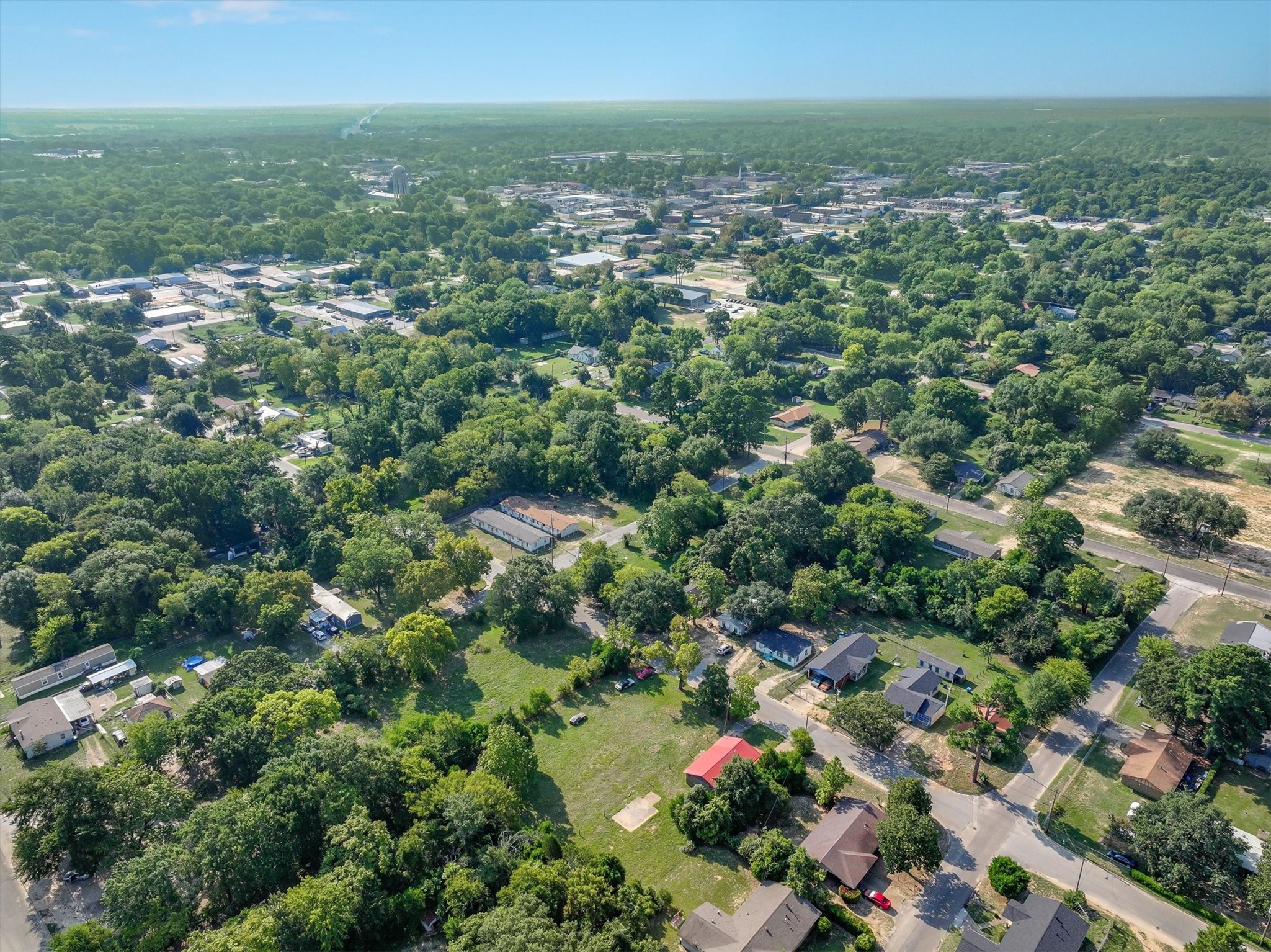 410 Williams Street Athens, TX 75751 - Photo 24 of 30 an aerial view of residential houses with outdoor space and trees
