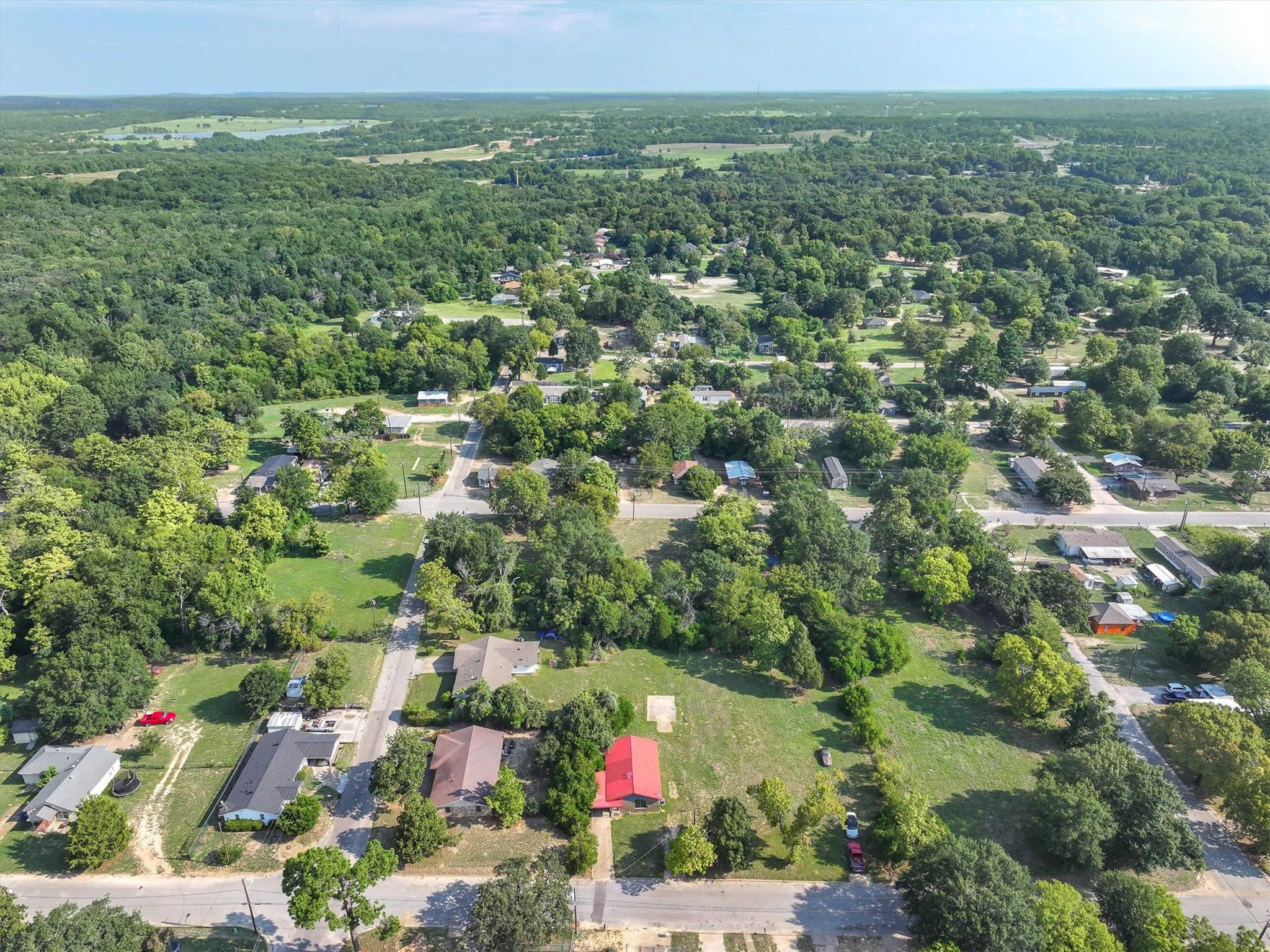 410 Williams Street Athens, TX 75751 - Photo 28 of 30 an aerial view of residential houses with outdoor space and trees
