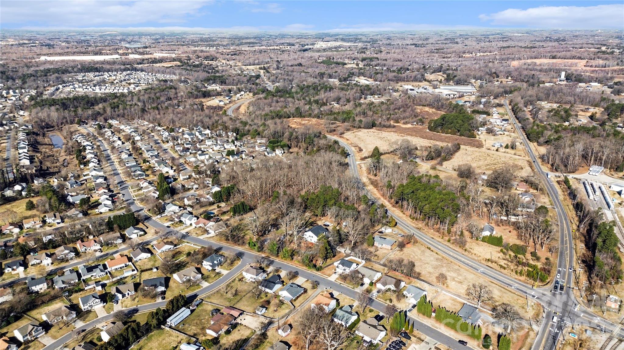0 Connector Road Mooresville, NC 28115 - Photo 3 of 4 an aerial view of residential houses with city view