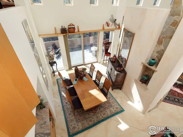 a view of living room with furniture and rug floor