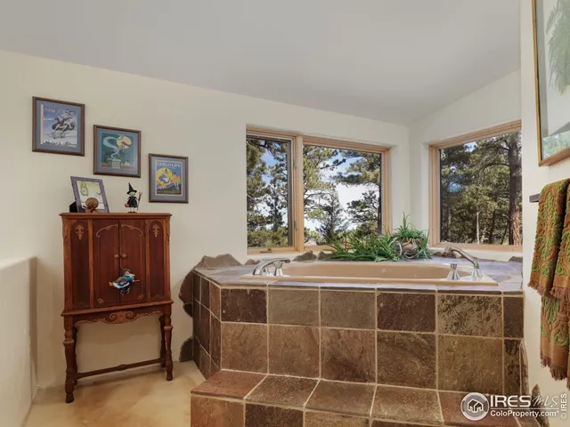 a room with a bed and a window