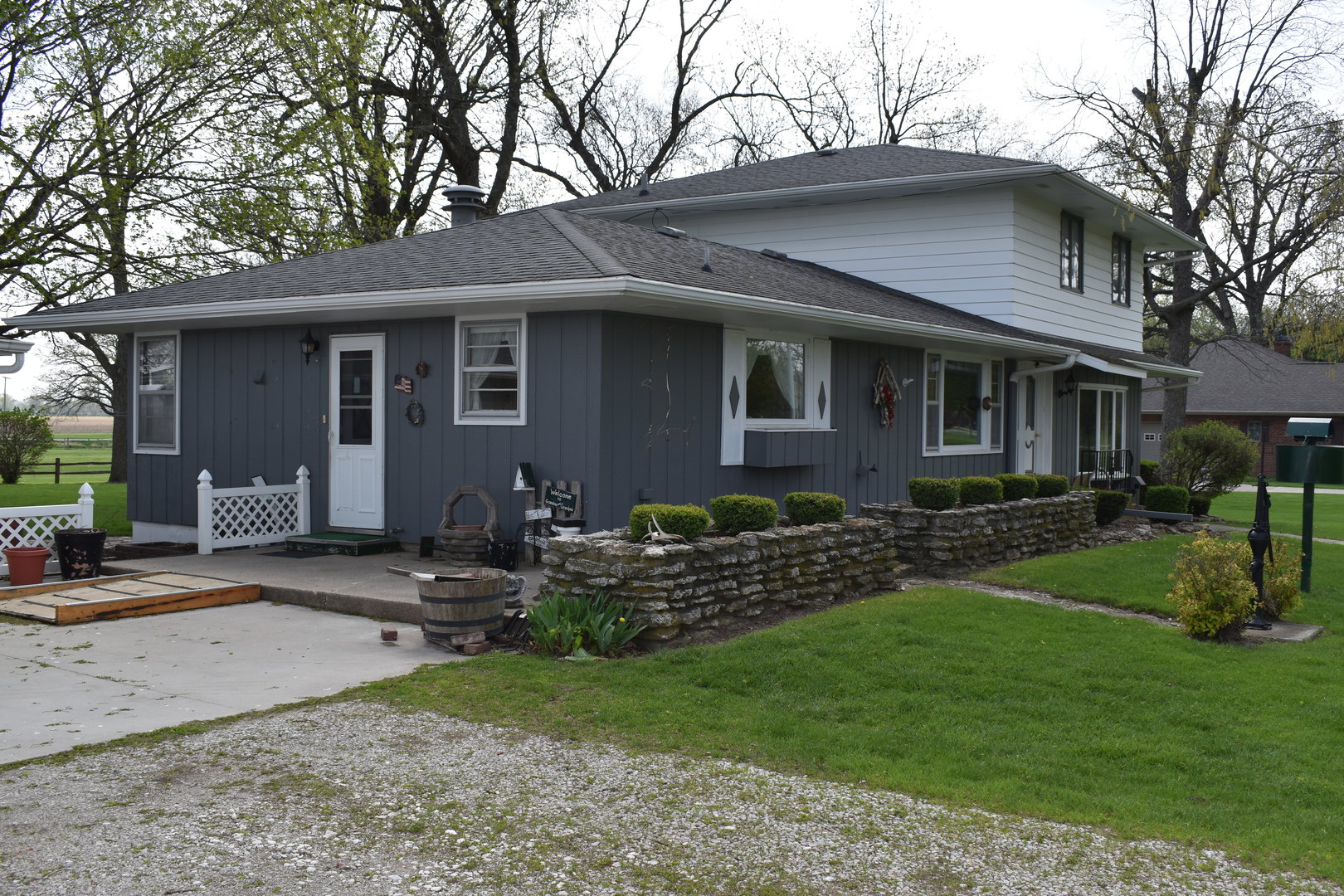 17864 East 1700 N Road Pontiac, IL 61764 - Photo 2 of 32 a front view of house with yard and outdoor seating