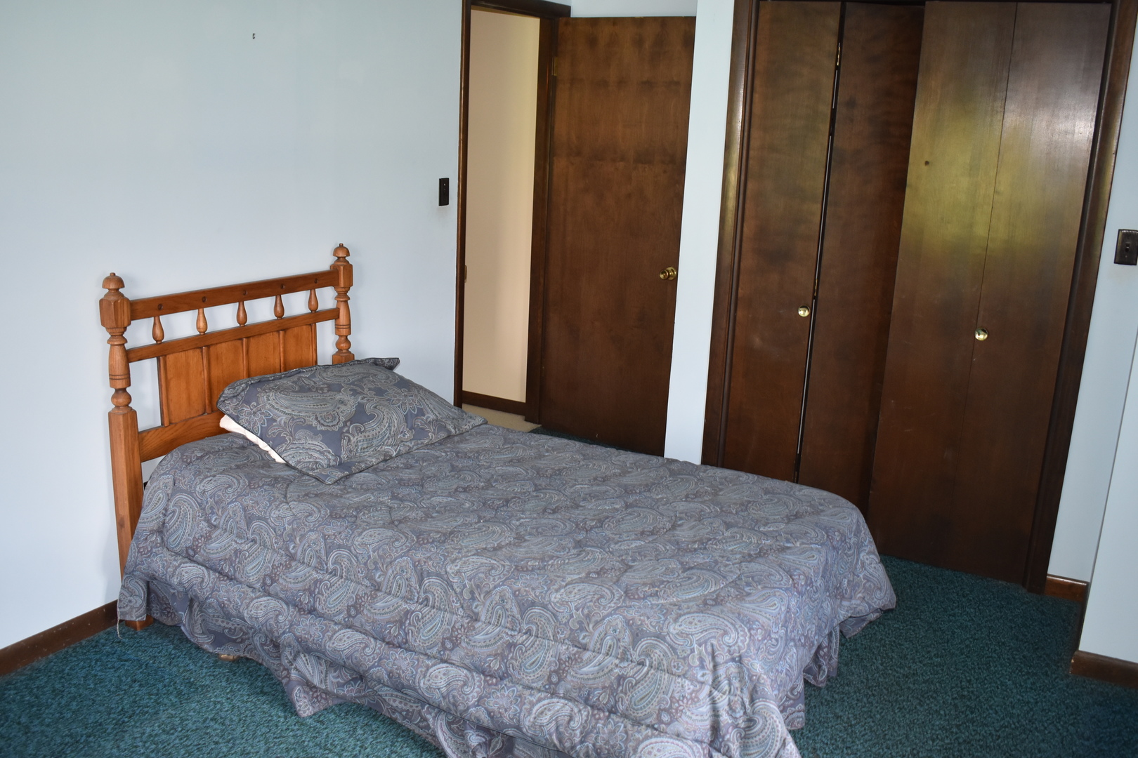 17864 East 1700 N Road Pontiac, IL 61764 - Photo 24 of 32 a bedroom with a bed and a mirror