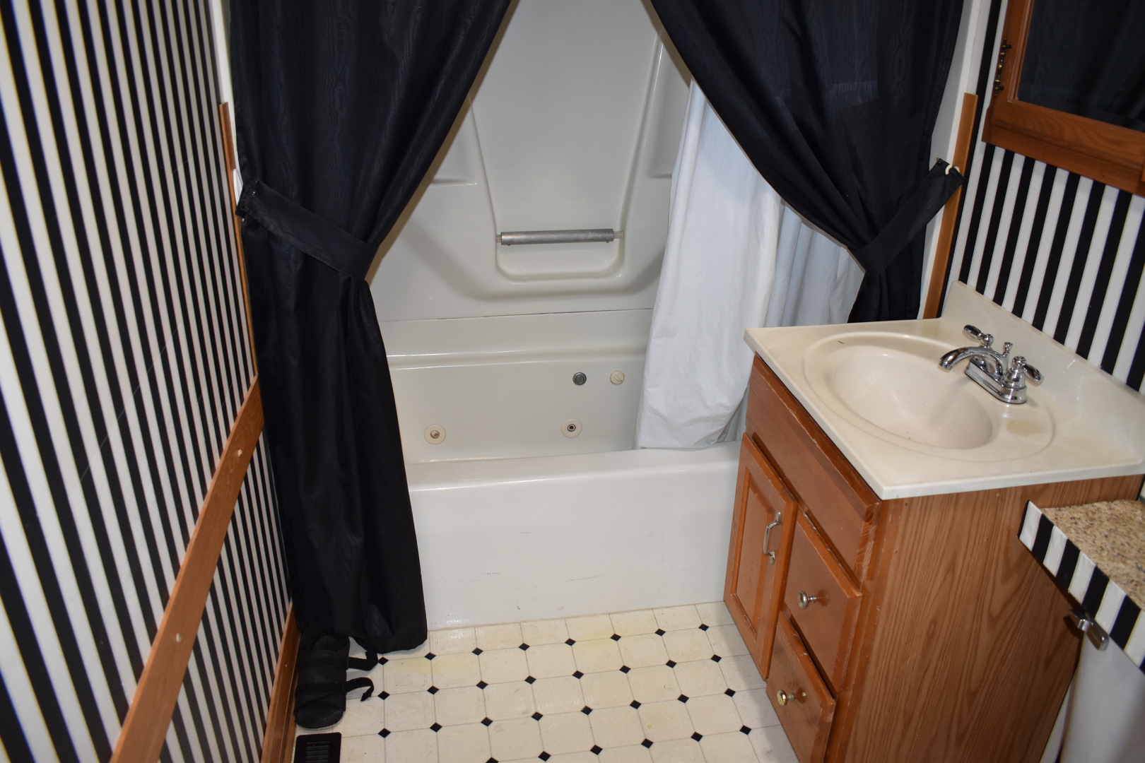 17864 East 1700 N Road Pontiac, IL 61764 - Photo 30 of 32 a bathroom with a sink a toilet and shower