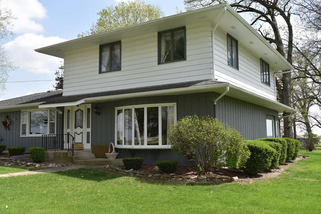 front view of a house with a yard