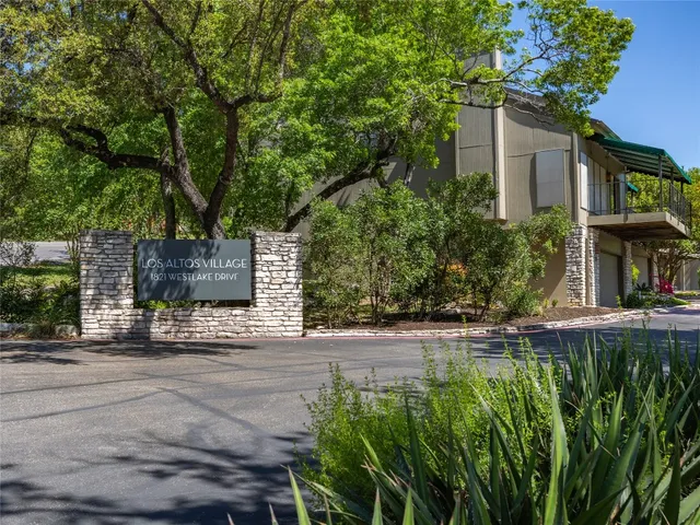 front view of a house with a garden