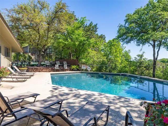 a view of a lake with sitting area