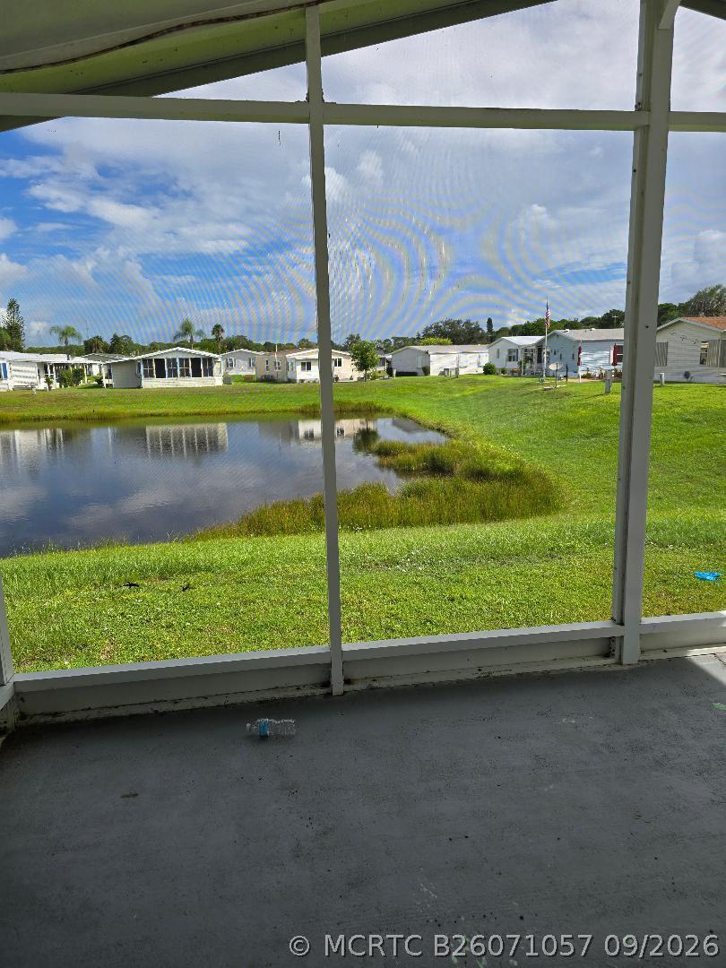 504 Thames Bluff Ridge, Unit D23 Fort Pierce, FL 34982 - Photo 2 of 7 504 thames back porch east view