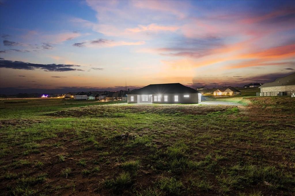 3028 West Frk Way Springtown, TX 76082 - Photo 20 of 24 Backyard at dusk.