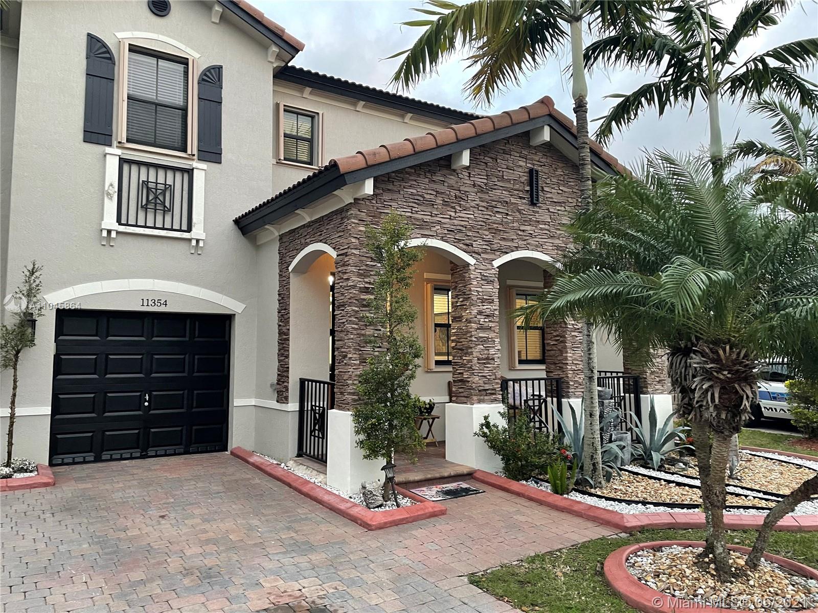 11354 Southwest 241st Street Homestead, FL 33032 - Photo 1 of 6