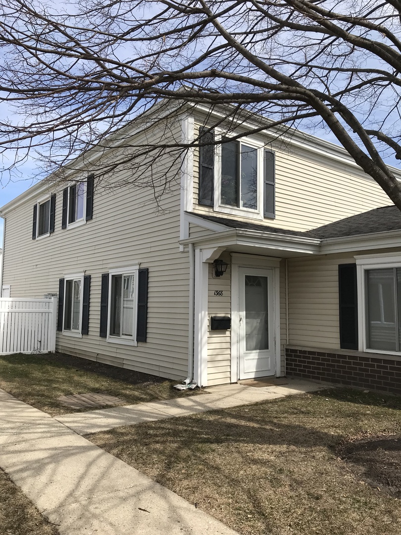 1368 Quaker Lane Prospect Heights, IL 60070 - Photo 1 of 14 a house with a outdoor space