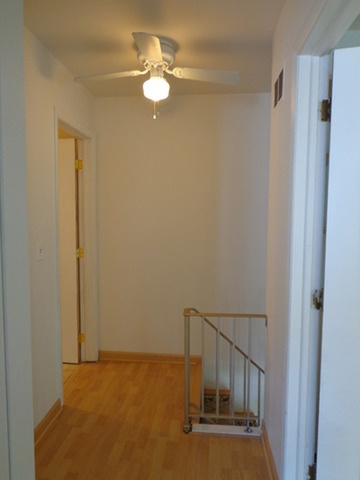 1368 Quaker Lane Prospect Heights, IL 60070 - Photo 13 of 14 a view of entryway with wooden floor