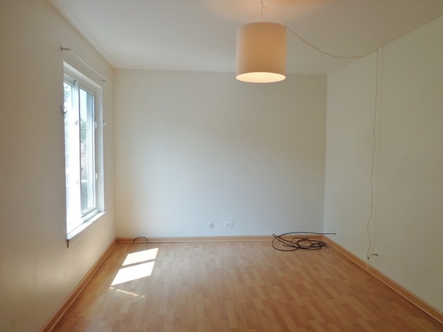 1368 Quaker Lane Prospect Heights, IL 60070 - Photo 7 of 14 an empty room with windows