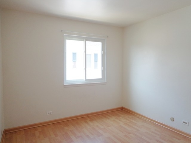 1368 Quaker Lane Prospect Heights, IL 60070 - Photo 10 of 14 an empty room with a window