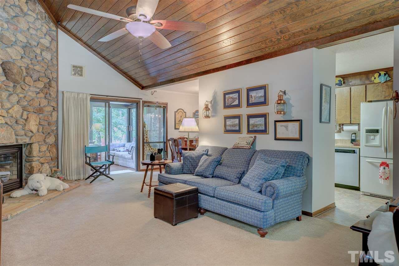 7401 Valley Run Drive Raleigh, NC 27615 - Photo 3 of 22 a living room with furniture and a fireplace