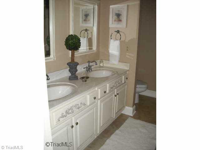 1060 Woodbury Road King, NC 27021 - Photo 7 of 9 Other. GORGEOUS MASTER BATH W/DOUBLE VANITY,JACUZZI TUB,SEPERATE SHOWER!