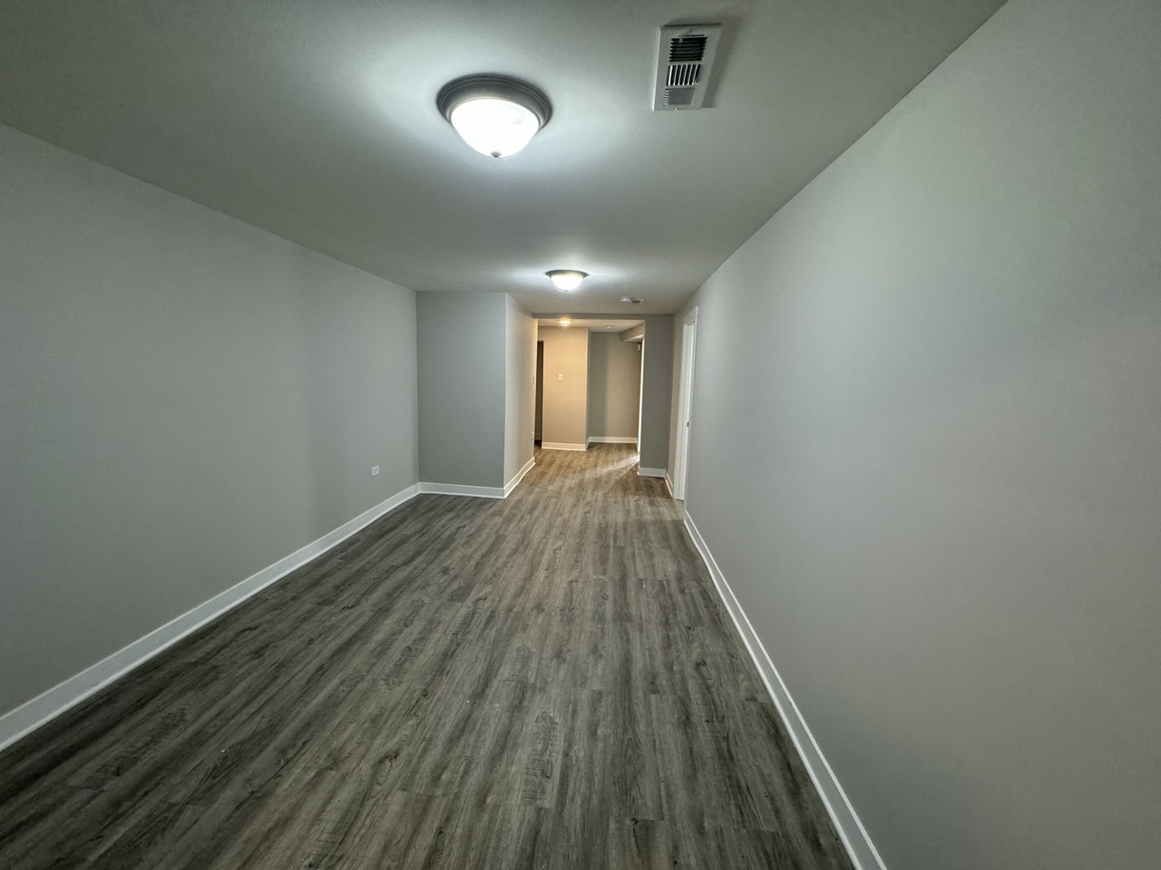 6830 South Michigan Avenue Chicago, IL 60637 - Photo 5 of 10 a view of hallway with wooden floor