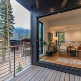 a view of a terrace with chairs and wooden floor