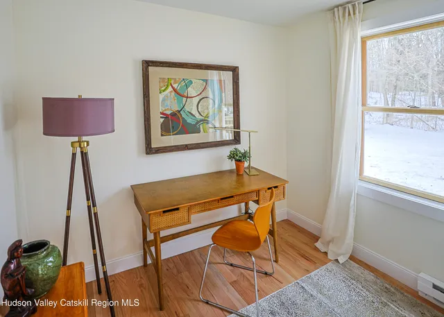 a room with furniture and a window