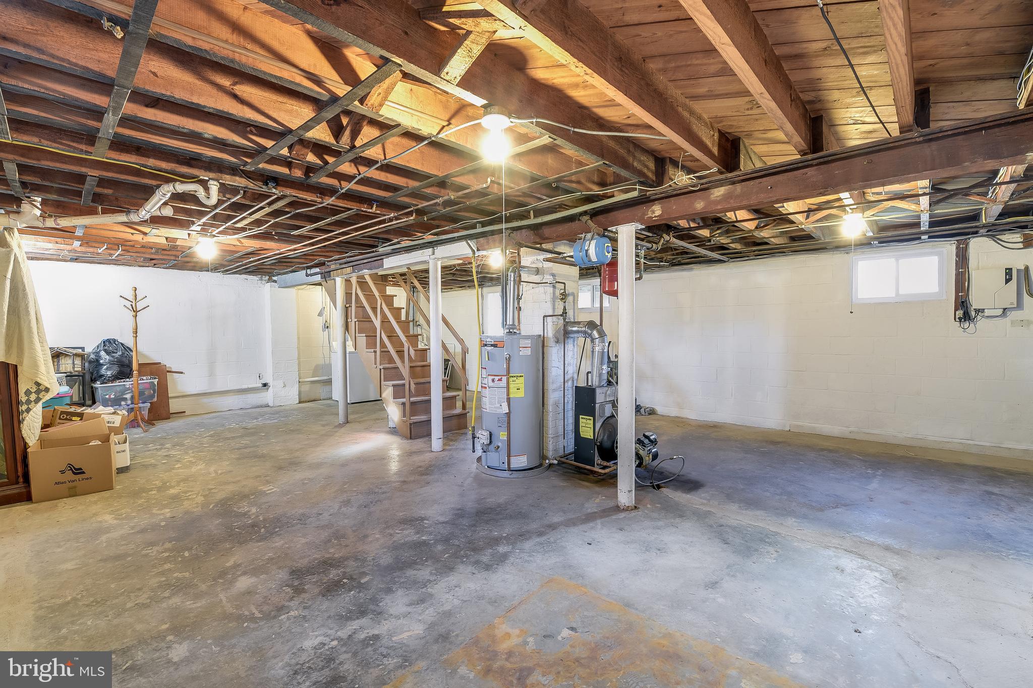 5533 Hutton Avenue Baltimore, MD 21207 - Photo 26 of 39 a view of empty room with wooden ceiling