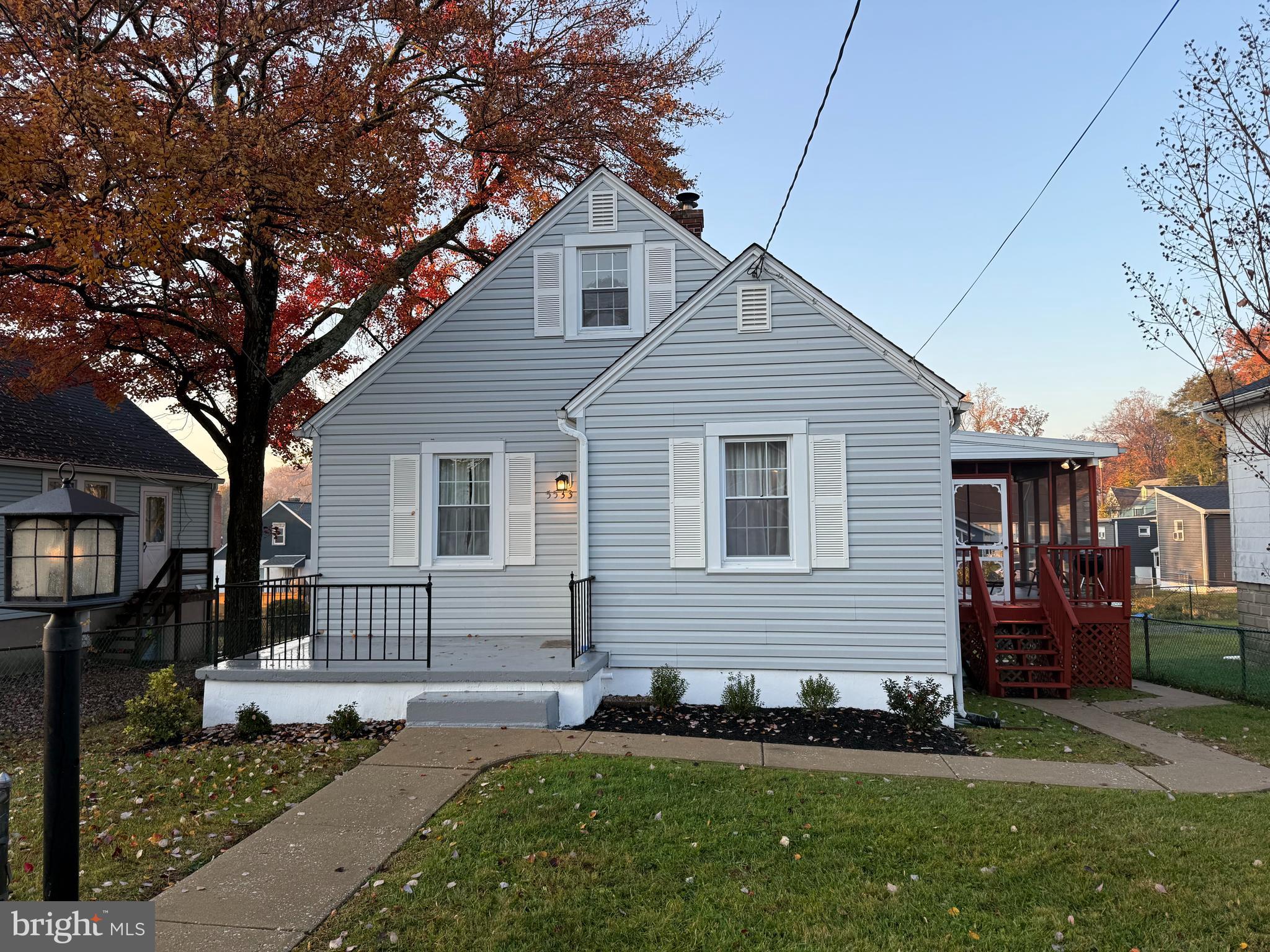 5533 Hutton Avenue Baltimore, MD 21207 - Photo 31 of 39 a front view of a house with a garden
