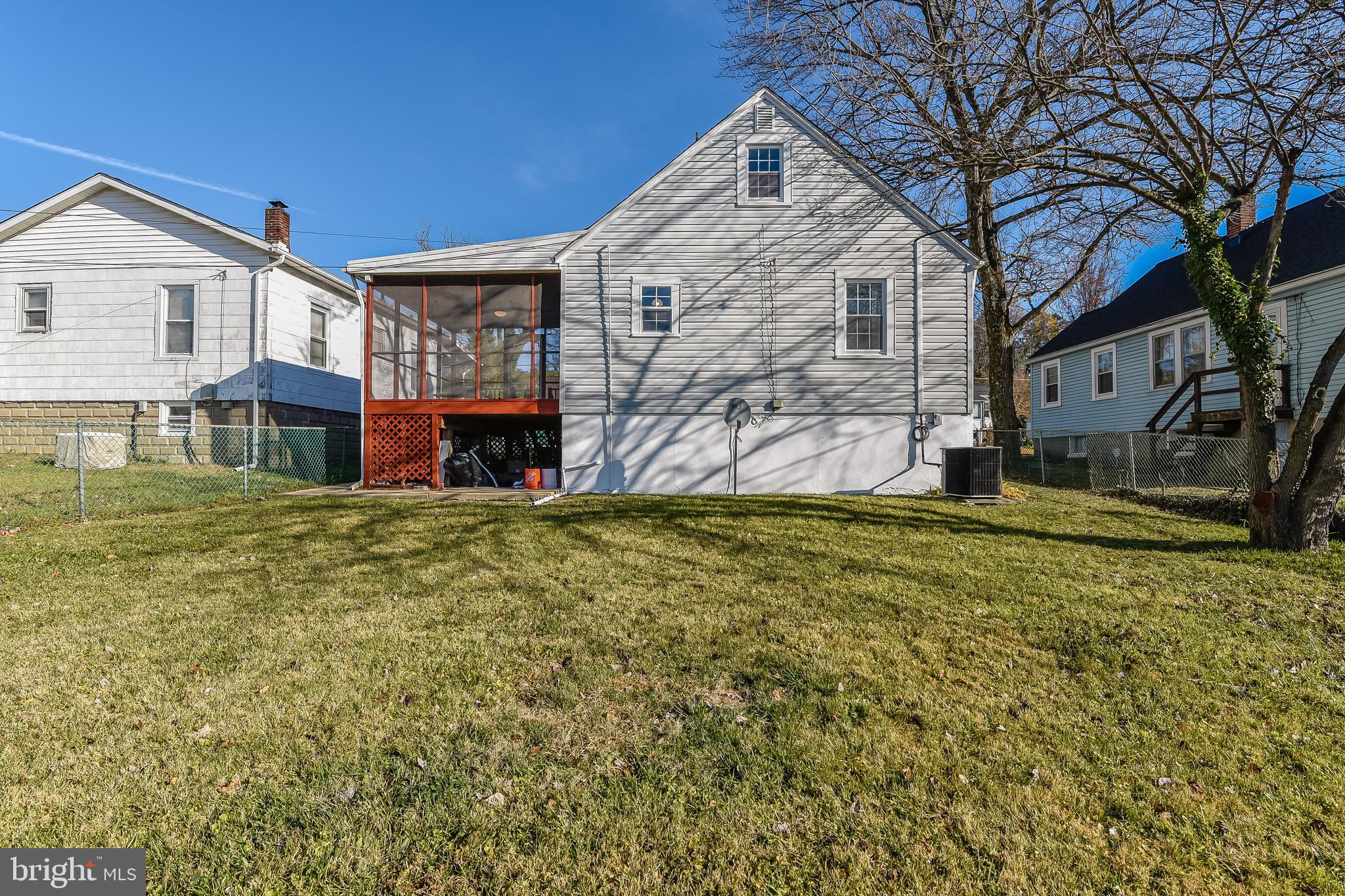 5533 Hutton Avenue Baltimore, MD 21207 - Photo 32 of 39 a view of a house with a yard