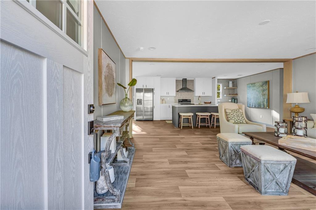946 Essic Road Ball Ground, GA 30107 - Photo 3 of 45 a living room with furniture and a table