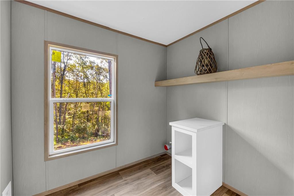 946 Essic Road Ball Ground, GA 30107 - Photo 31 of 45 a utility room with dryer and washer