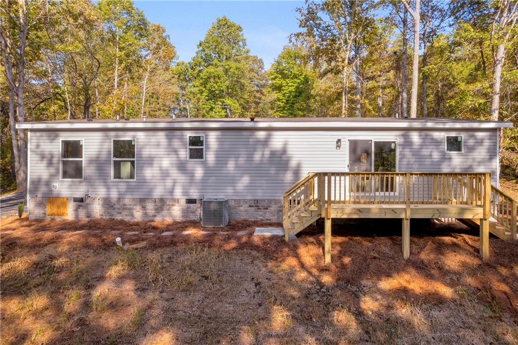 946 Essic Road Ball Ground, GA 30107 - Photo 41 of 45 front view of house with a yard