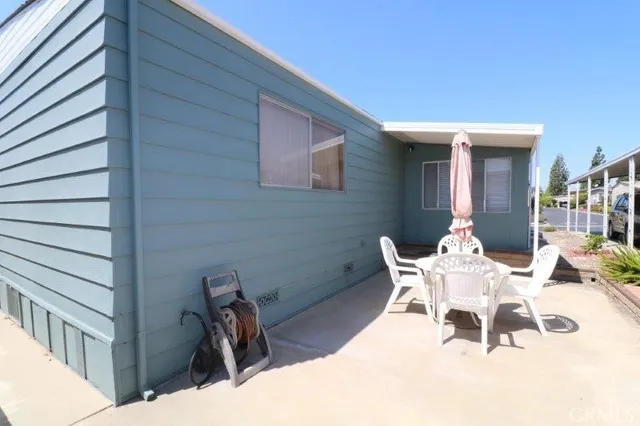 a view of a table and chairs in patio