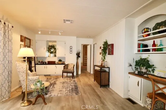 a bedroom with a bed and a table in it