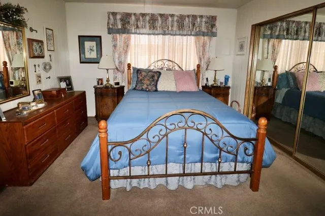 a bathroom with a sink a toilet and shower curtain