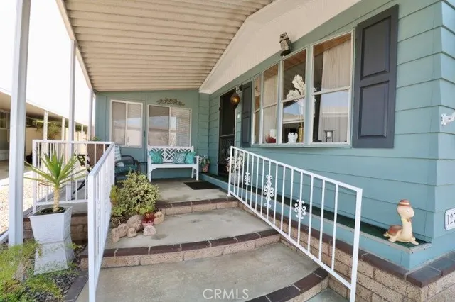 a view of balcony with glass door