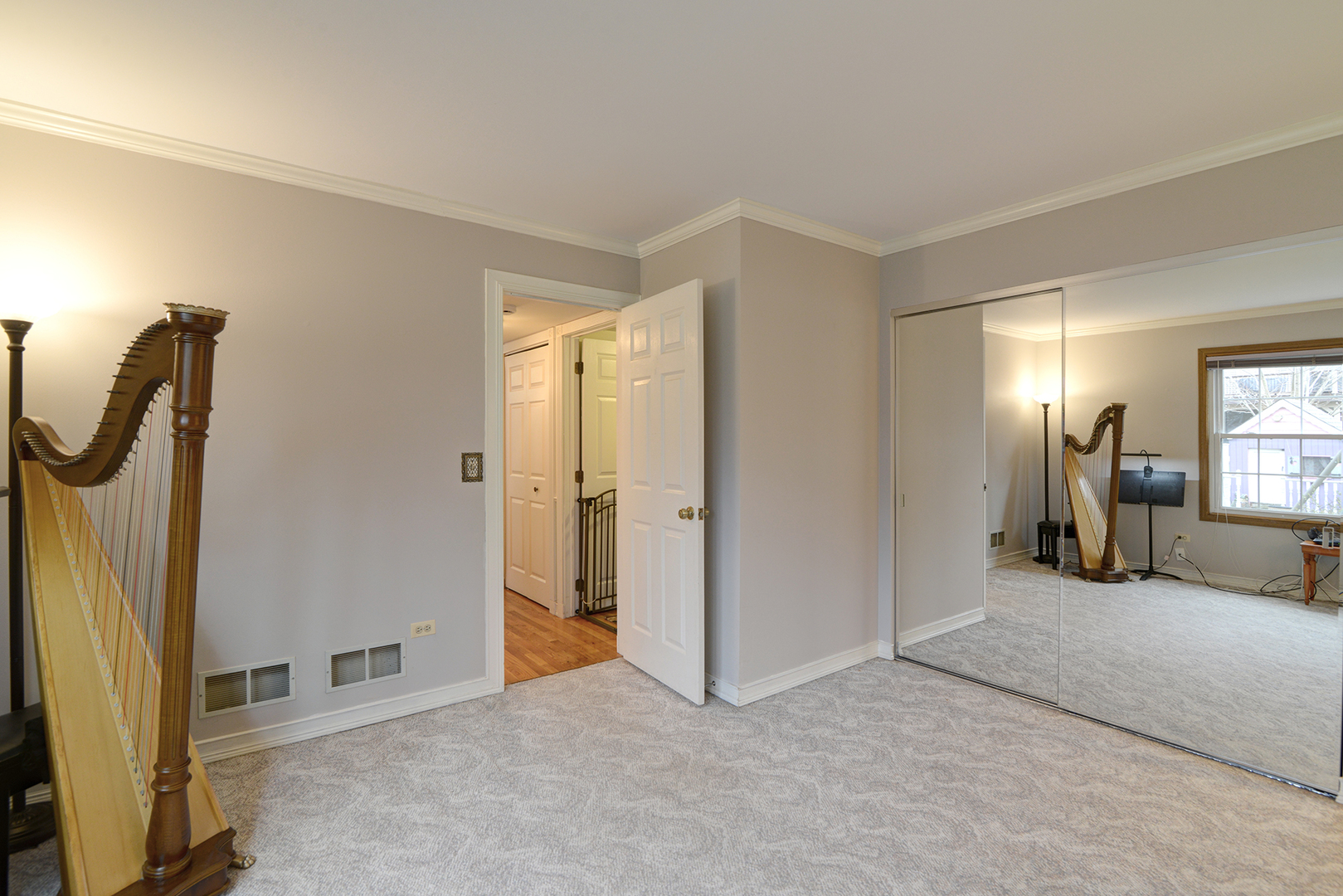 794 Burning Trail Carol Stream, IL 60188 - Photo 15 of 35 a view of a livingroom with wooden floor and a bathroom