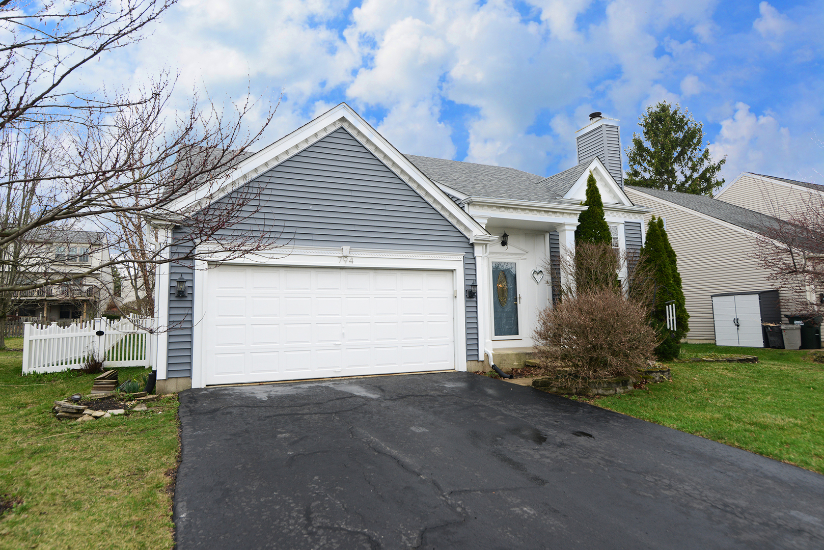 794 Burning Trail Carol Stream, IL 60188 - Photo 2 of 35 a front view of house with yard