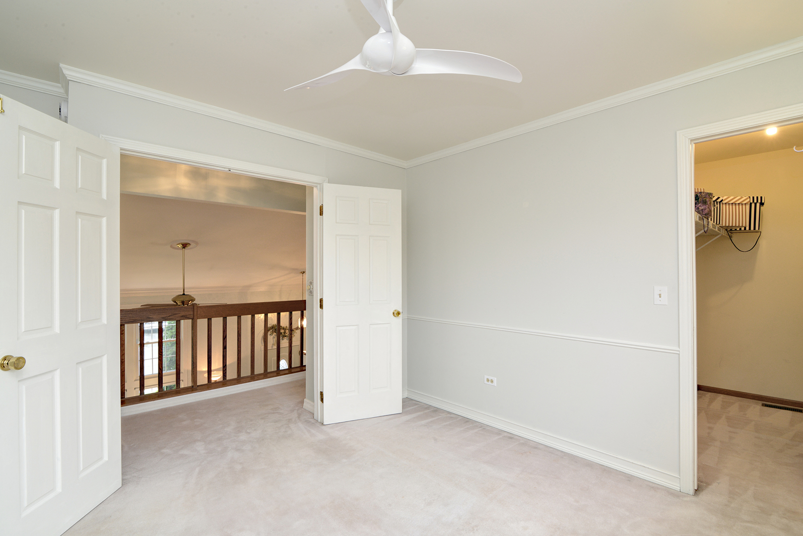 794 Burning Trail Carol Stream, IL 60188 - Photo 24 of 35 a view of a room with a hallway