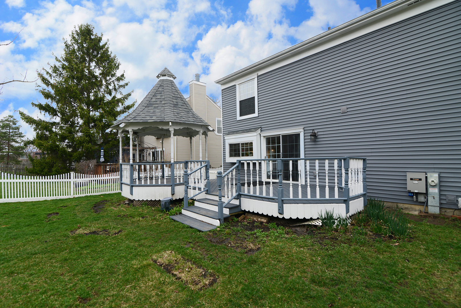 794 Burning Trail Carol Stream, IL 60188 - Photo 31 of 35 a view of a house with a yard and deck