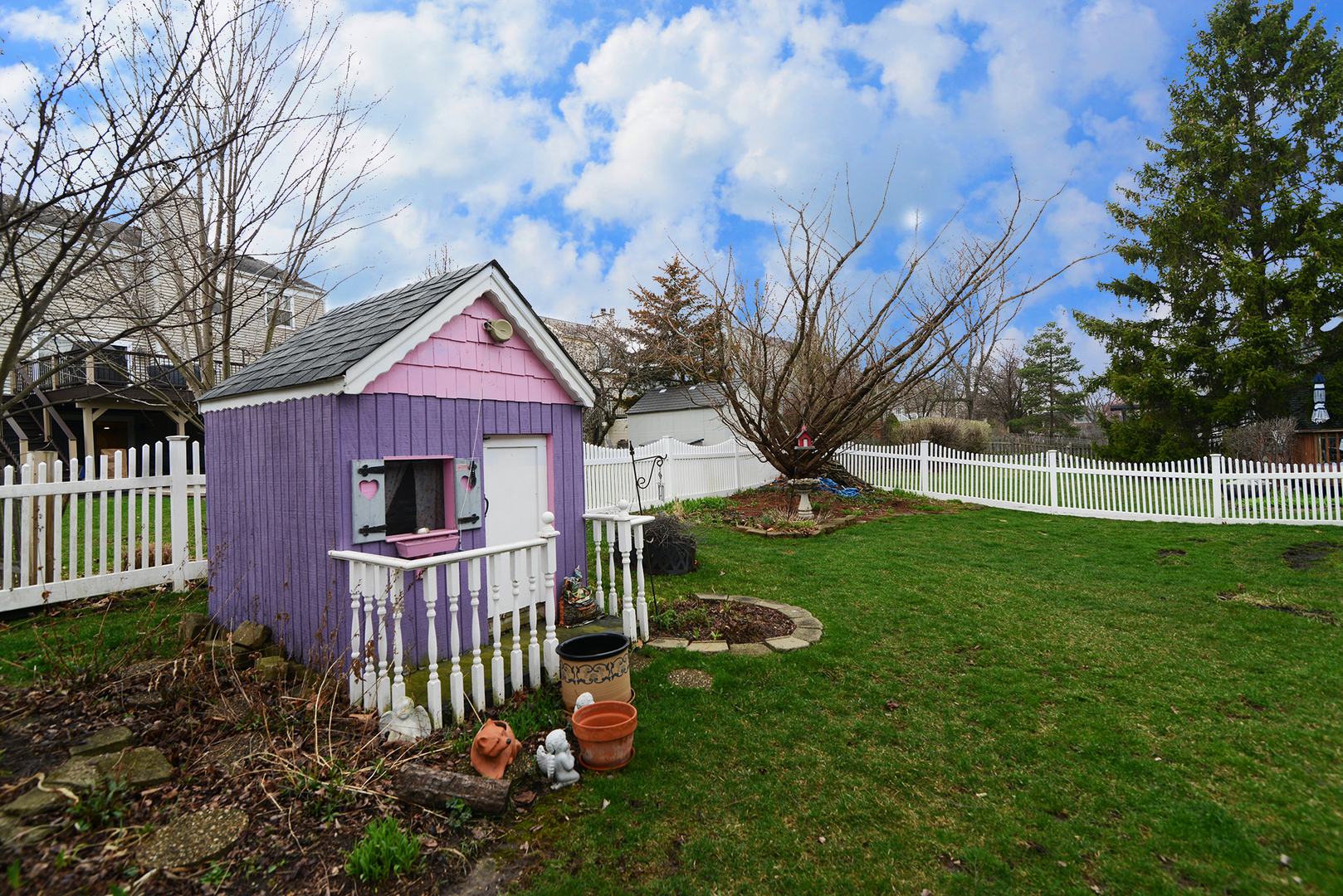 794 Burning Trail Carol Stream, IL 60188 - Photo 33 of 35 a view of a house with a yard and a garden