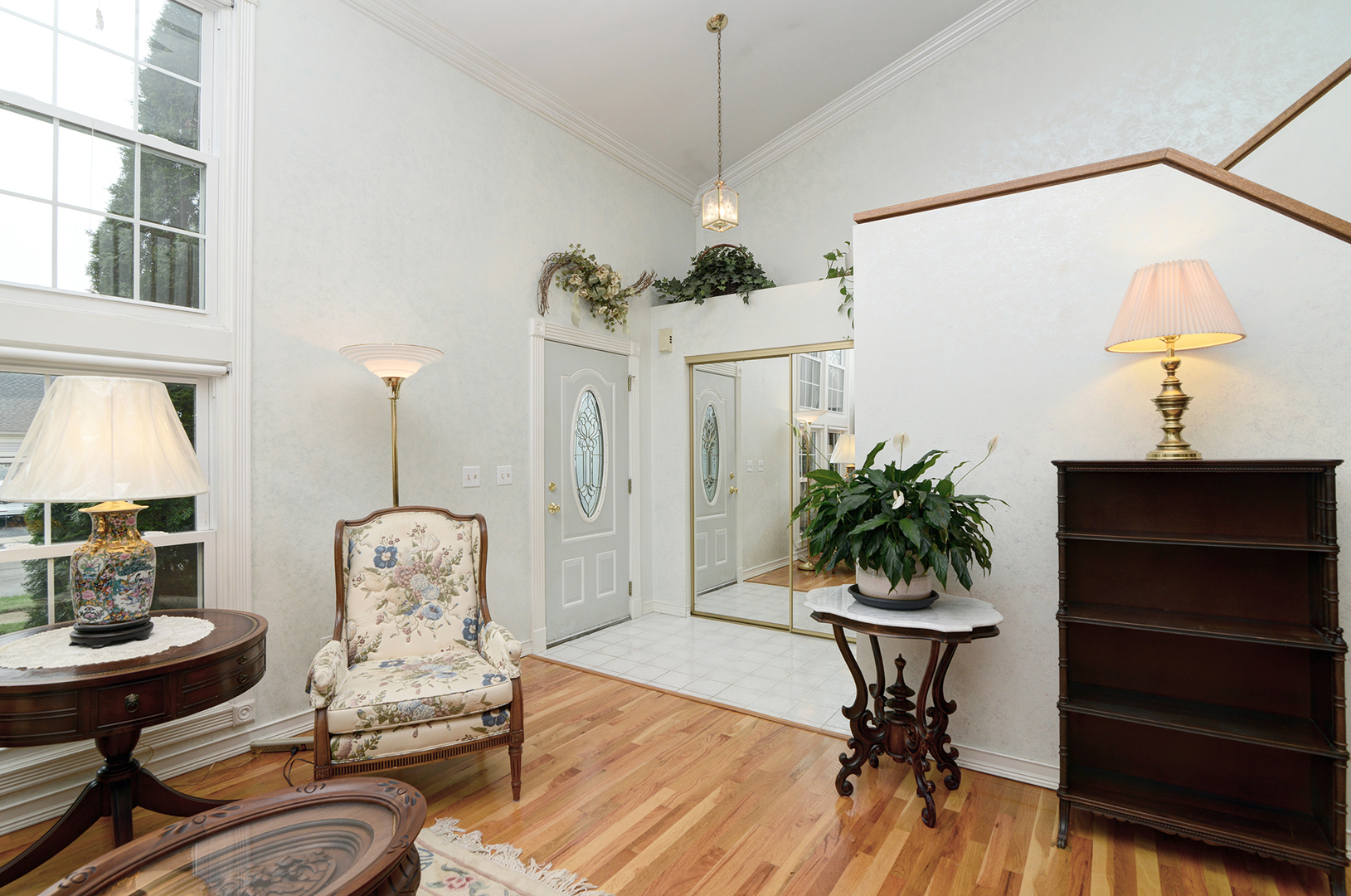 794 Burning Trail Carol Stream, IL 60188 - Photo 4 of 35 a living room with furniture and a chandelier