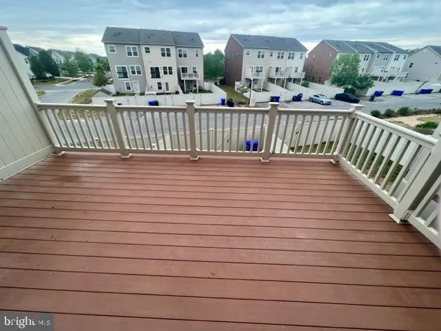 a view of a balcony with furniture