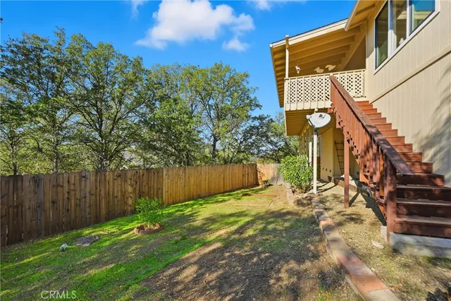 a view of a back yard of the house