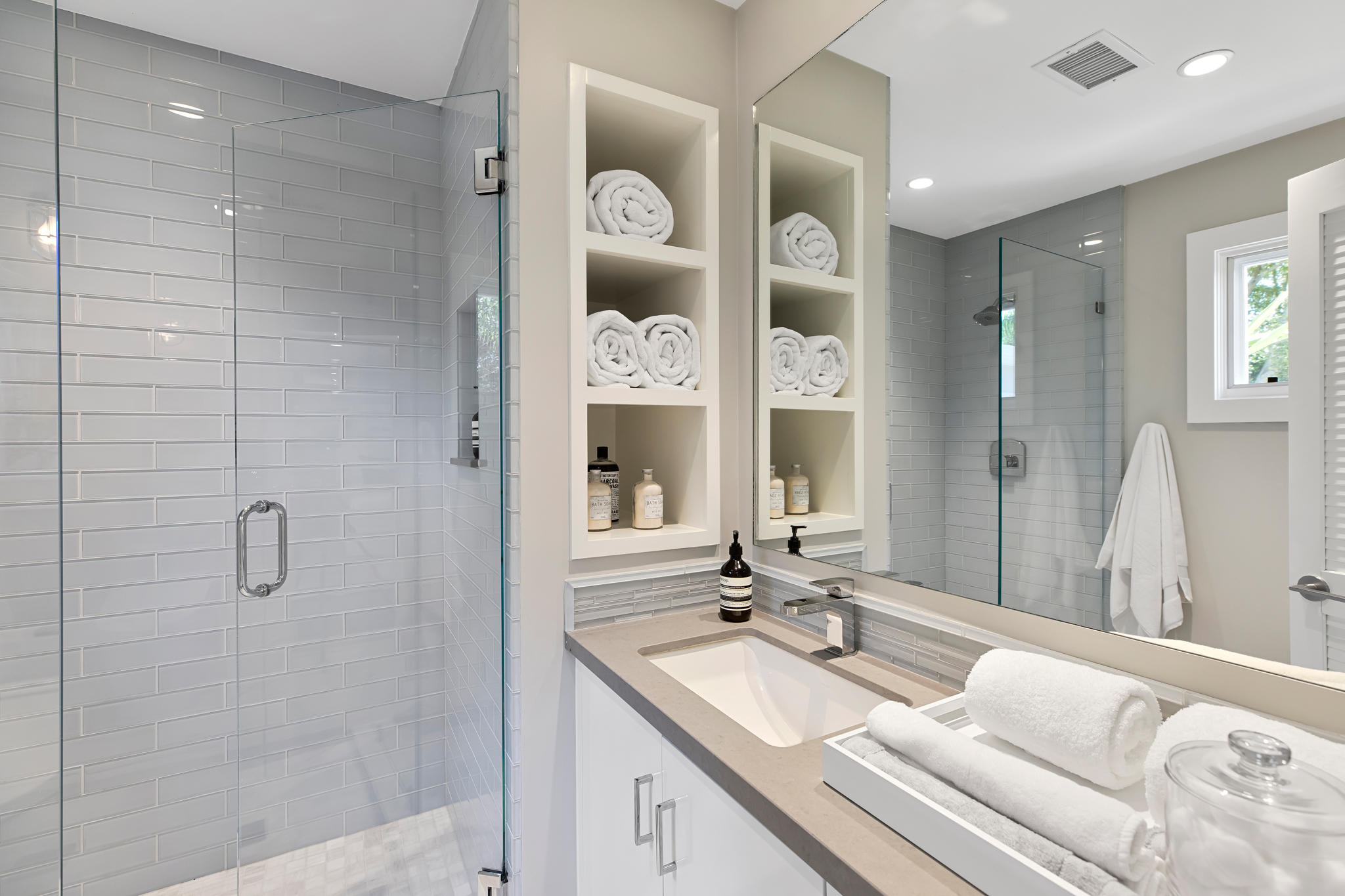 808 Riven Rock Road Santa Barbara, CA 93108 - Photo 15 of 44 a en suite bathroom with a granite countertop sink mirror and shower