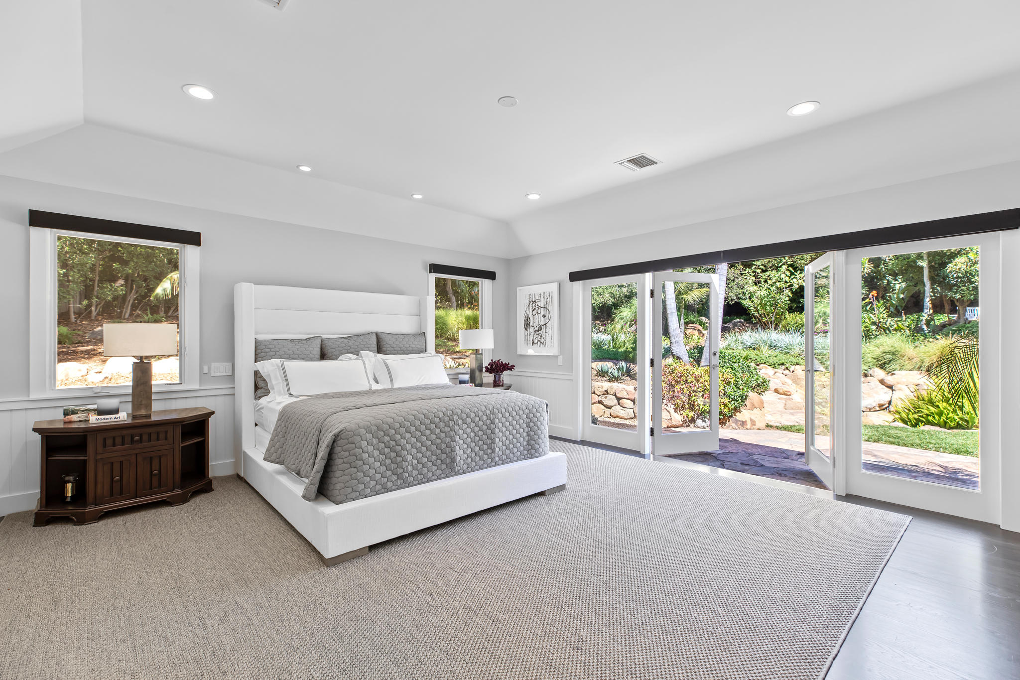 808 Riven Rock Road Santa Barbara, CA 93108 - Photo 18 of 44 a spacious bedroom with a large bed and a large window