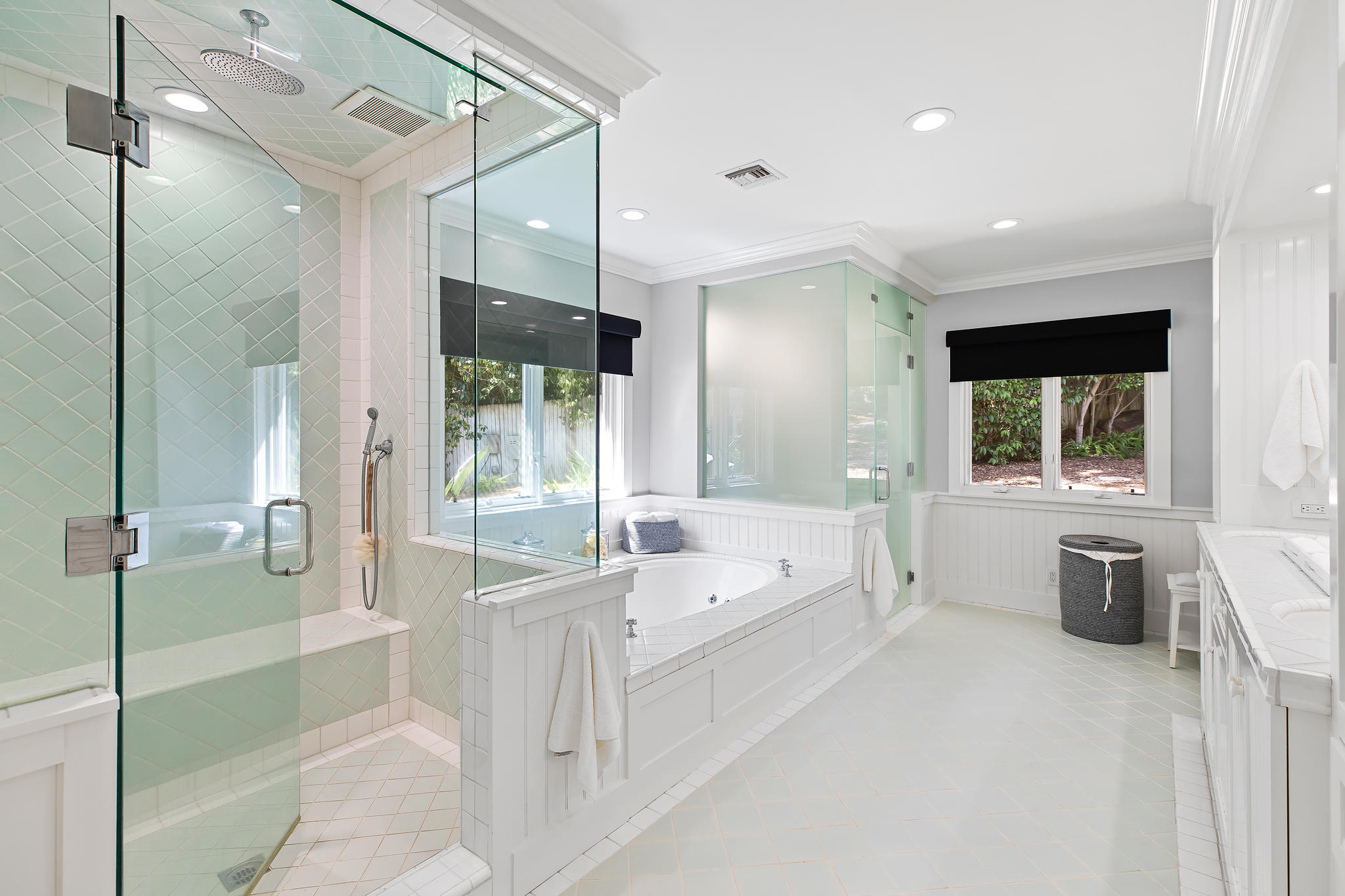 808 Riven Rock Road Santa Barbara, CA 93108 - Photo 19 of 44 a spacious bathroom with a tub sink shower and mirror