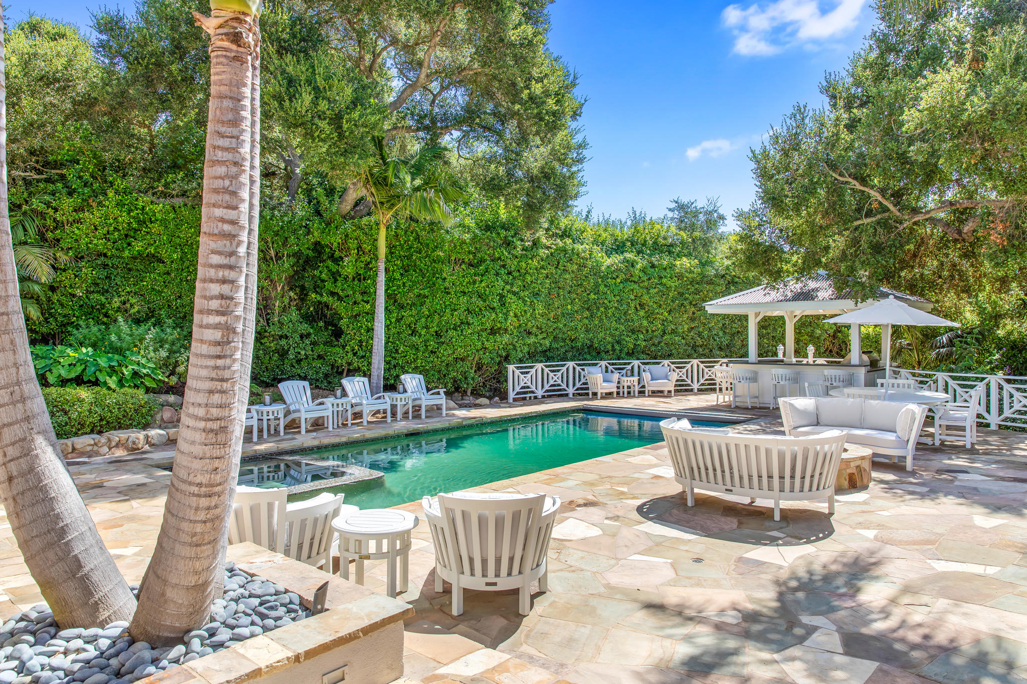 808 Riven Rock Road Santa Barbara, CA 93108 - Photo 24 of 44 a view of a chair and table in the patio